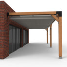 Overkapping pergola tegen gevel twee schaduwdoek - Rijpex